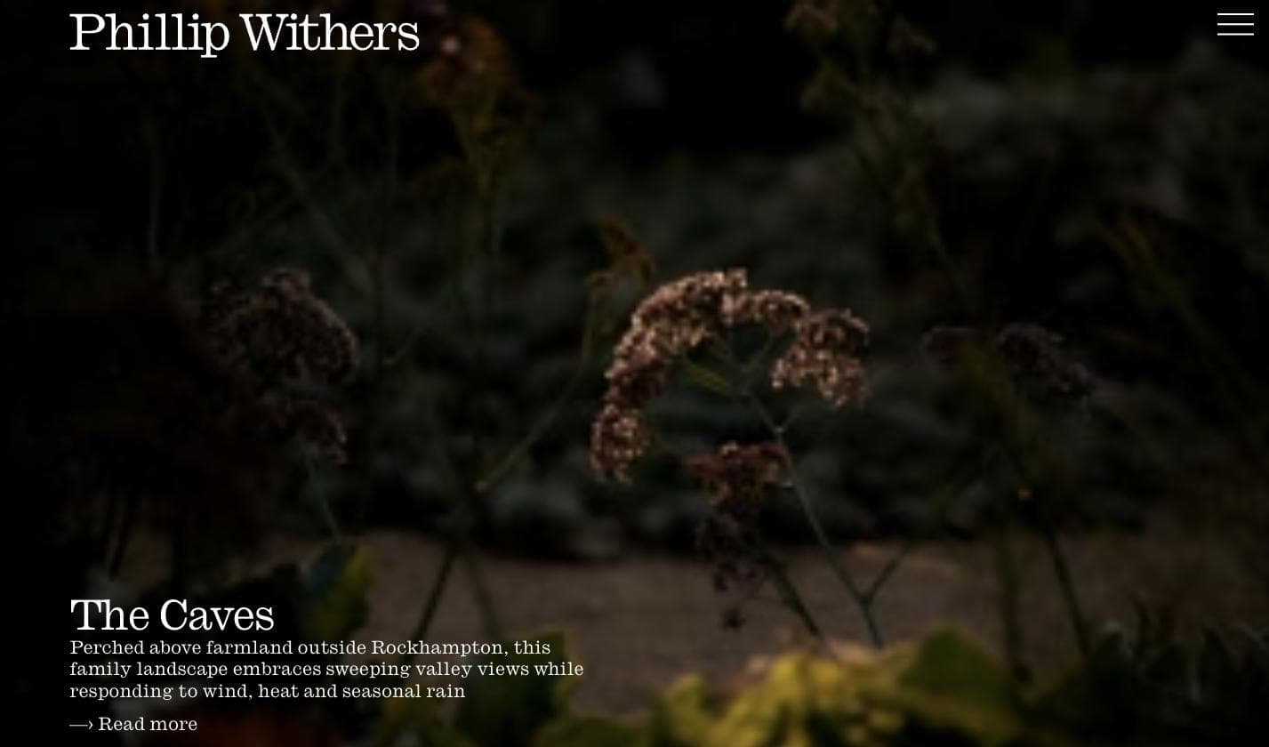 Phillip Withers Landscape Design homepage — a moody, editorial photo of native flowering plants with serif type reading "The Caves"